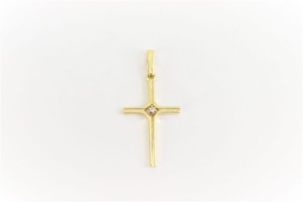 ein sehr schönes Kreuz in Gelbgold mit Diamant